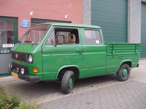 Groene VW T3 pick-up met dubbele cabine