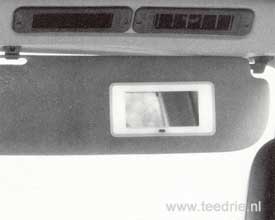 M 999 zonneklep met spiegel in de cabine van een VW T3
